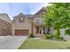 Beautiful two-story brick home with a well-manicured lawn and a two-car garage in a desirable neighborhood at 1830 Secretariat Gait Way, Suwanee, GA 30024