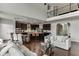 Bright, open-concept living room and kitchen with hardwood floors and modern finishes at 1830 Secretariat Gait Way, Suwanee, GA 30024