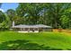 Spacious backyard with mature trees and well maintained lawn at 2463 Briarmoor Ne Rd, Atlanta, GA 30345