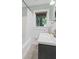 Cozy bathroom featuring a white subway tile shower and a hexagon tile floor at 2463 Briarmoor Ne Rd, Atlanta, GA 30345