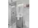 Bathroom with a glass shower door, featuring gray vanity, and modern fixtures at 2463 Briarmoor Ne Rd, Atlanta, GA 30345