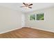 Bright bedroom with hardwood floors and a window overlooking the yard at 2463 Briarmoor Ne Rd, Atlanta, GA 30345