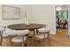 Bright dining room features a round table, comfortable chairs, and stylish decor, enhancing the inviting atmosphere at 2463 Briarmoor Ne Rd, Atlanta, GA 30345