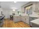 Open concept kitchen with stainless steel appliances, bright lighting, and hardwood floors for a modern look at 2463 Briarmoor Ne Rd, Atlanta, GA 30345