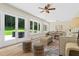 Spacious living area featuring hardwood floors, natural light, and access to the backyard at 2463 Briarmoor Ne Rd, Atlanta, GA 30345