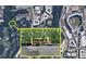 Aerial view showcasing property location near Truist Park, surrounded by trees and green space at 1010 Donegal Se, Smyrna, GA 30080