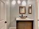 Bathroom featuring a designer sink and bronze mirror at 1010 Donegal Se, Smyrna, GA 30080