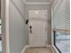 Welcoming entryway with neutral paint, tile flooring, and a window for natural light at 1010 Donegal Se, Smyrna, GA 30080