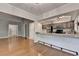 Bright eat-in kitchen featuring stainless appliances, granite countertops and access to the living room at 1010 Donegal Se, Smyrna, GA 30080