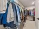 Spacious walk-in closet with hanging rods and shelves for plenty of storage at 1104 Knoxboro Ln, Woodstock, GA 30188