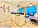 Open concept kitchen with stainless steel appliances and access to living room at 400 W Peachtree Nw St # 2704, Atlanta, GA 30308