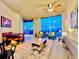 Bright living room with hardwood floors, floor to ceiling windows, and an open floor plan at 400 W Peachtree Nw St # 2704, Atlanta, GA 30308