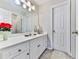 Bathroom with a single sink vanity and white cabinets at 4450 Barony Dr, Suwanee, GA 30024