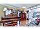 Elegant living room boasts a grand piano and stylish furnishings at 4450 Barony Dr, Suwanee, GA 30024