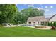Expansive backyard boasts a swimming pool, hot tub, fire pit, and ample green space at 5095 Karr Road Rd, Cumming, GA 30040