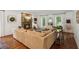 Inviting living room showcasing a stone fireplace, large sofa, and stylish decor at 5095 Karr Road Rd, Cumming, GA 30040