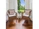 Charming sitting area with hardwood floors, wainscoting and outdoor view at 5095 Karr Road Rd, Cumming, GA 30040