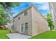 The home's exterior showcases the private back patio and expansive yard at 5865 El Segundo Way, Atlanta, GA 30349