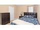 Comfortable bedroom featuring a cozy bed, dresser, and natural light from the window at 5865 El Segundo Way, Atlanta, GA 30349