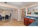 Functional kitchen area with updated appliances and views of the dining area; perfect for cooking and entertaining guests at 5865 El Segundo Way, Atlanta, GA 30349