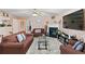 Cozy living room featuring a fireplace, ceiling fan, and comfortable seating; the perfect space to relax and unwind at 5865 El Segundo Way, Atlanta, GA 30349