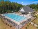 Resort-style pool with lounge chairs and a spa tub offer a luxurious experience for residents at 113 Poppy St, Mcdonough, GA 30253