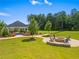 Community features a fire pit and seating area, perfect for gatherings and outdoor enjoyment at 113 Poppy St, Mcdonough, GA 30253