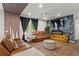 Beautifully staged living room with hardwood floors and stylish decor elements at 113 Poppy St, Mcdonough, GA 30253