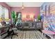 Eclectic office space with a unique mural, modern furnishings, and ample natural light, creating a creative atmosphere at 113 Poppy St, Mcdonough, GA 30253