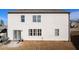 Exterior view of the home showcasing the backyard and partial fence at 8484 Glenview St, Douglasville, GA 30134