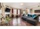 Inviting living room with a fireplace, hardwood floors, and ample natural light at 8484 Glenview St, Douglasville, GA 30134