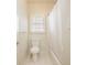 Cozy bathroom with tiled floors, a shower-tub combo, and window with shutter at 205 Finsbury Park Ct, Suwanee, GA 30024