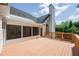 Spacious deck with access to a screened porch, ideal for outdoor entertaining and relaxation at 205 Finsbury Park Ct, Suwanee, GA 30024