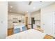 Bright eat-in kitchen featuring white cabinets, stainless steel appliances, and a center island at 205 Finsbury Park Ct, Suwanee, GA 30024