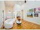 Bright and airy living room with hardwood floors, tall ceilings, and natural light at 205 Finsbury Park Ct, Suwanee, GA 30024