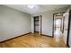 Bedroom with hardwood flooring and closet at 494 Rue Montaigne, Stone Mountain, GA 30083