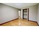 Bedroom with hardwood flooring and closet at 494 Rue Montaigne, Stone Mountain, GA 30083