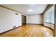 Bright living room with shiny hardwood floors and trim at 494 Rue Montaigne, Stone Mountain, GA 30083