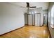 Bright main bedroom featuring hardwood floors, vaulted ceiling, and two closets at 494 Rue Montaigne, Stone Mountain, GA 30083