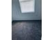 A bedroom featuring gray carpeting, and a window with closed white blinds at 1188 To Lani Path, Stone Mountain, GA 30083