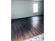 Spacious living room with wood floors and plenty of natural light at 1188 To Lani Path, Stone Mountain, GA 30083