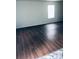 Spacious living room with wood floors and plenty of natural light at 1188 To Lani Path, Stone Mountain, GA 30083