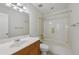 Bathroom featuring a vanity, mirror, lighting and a bathtub with shower at 2825 Northeast Ne Expy # F003, Atlanta, GA 30345