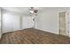 Bedroom features hardwood floor, ceiling fan, closet and bathroom at 2825 Northeast Ne Expy # F003, Atlanta, GA 30345