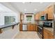 Spacious kitchen with wood cabinets, stainless appliances, and granite countertops at 2825 Northeast Ne Expy # F003, Atlanta, GA 30345