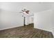 The airy living room has hardwood floors, white walls, and an open floor plan at 2825 Northeast Ne Expy # F003, Atlanta, GA 30345