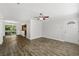Spacious living room features wood floors, ceiling fan, and sliding doors to a deck at 2825 Northeast Ne Expy # F003, Atlanta, GA 30345