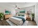 Stylish main bedroom with a bed, two dressers, plants and modern decor at 2825 Northeast Ne Expy # F003, Atlanta, GA 30345