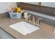 Close-up of bathroom sink with quartz countertop at 545 Ashvale Overlook, Alpharetta, GA 30005