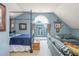 Bedroom with large window and seating area at 545 Ashvale Overlook, Alpharetta, GA 30005
